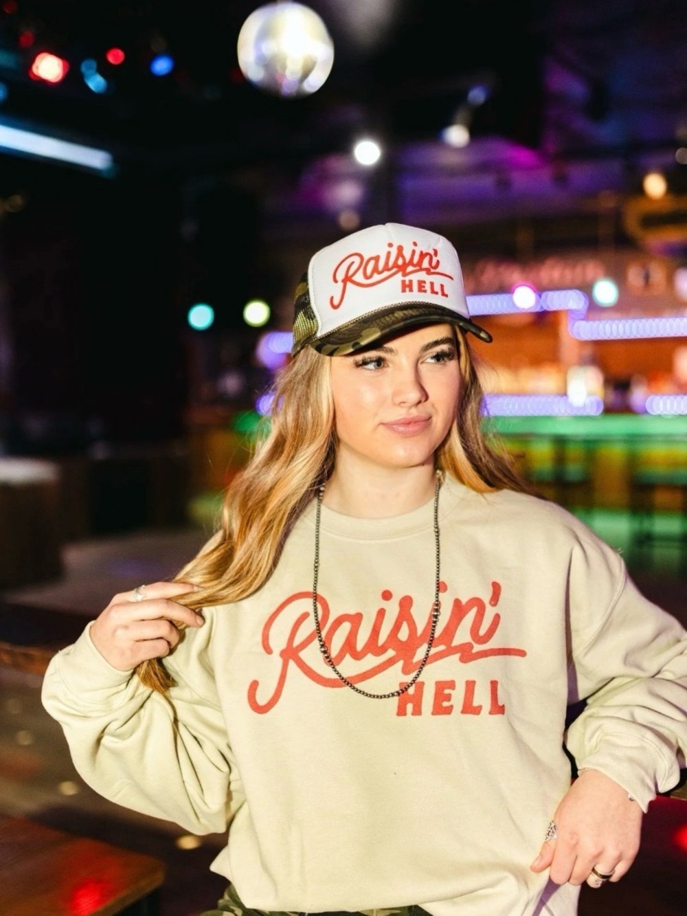 Gildan “Raisin’ Hell” Beige Oversized Graphic Sweatshirt with Red Text Logo